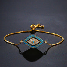 Load image into Gallery viewer, Blue Eye Gold Color Bracelets
